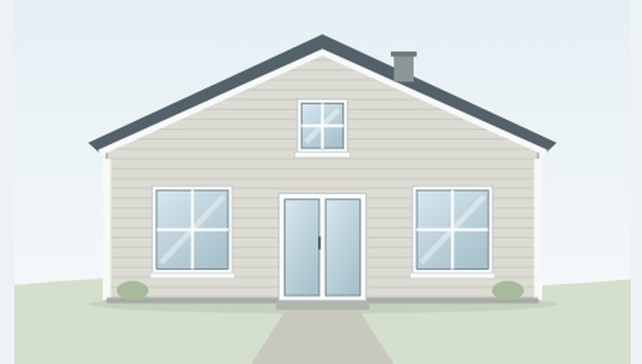 The whole side of a house photographed from the ground